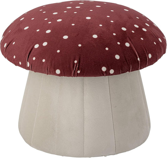 A mushroom-shaped kids’ seat with a soft red polka dot cover and a sturdy MDF base. Perfect as a footrest or extra seat.